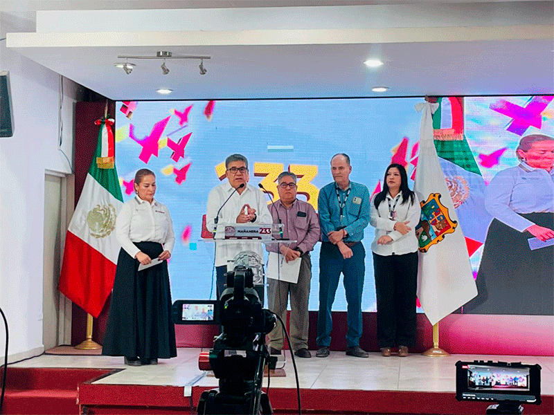 autoridades y personal asistente.