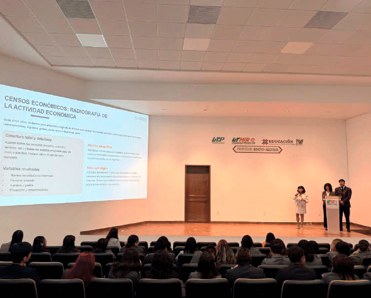 ponente y asistentes al evento.